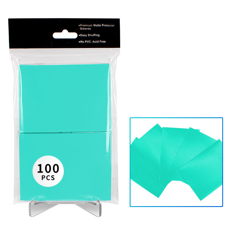 Turquoise card sleeves in a clear package with a close-up inset showing the product.